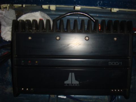 1992 Ford Bronco - A black JL Audio 500/1 amplifier is visible, likely installed in a vehicle's interior.