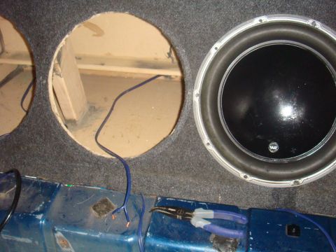 1992 Ford Bronco - Car subwoofer installation in progress, showing enclosure and wiring.