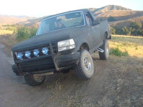 1992 Ford Bronco - This 1992 Ford Bronco is equipped with auxiliary lights and appears to be off-roading.