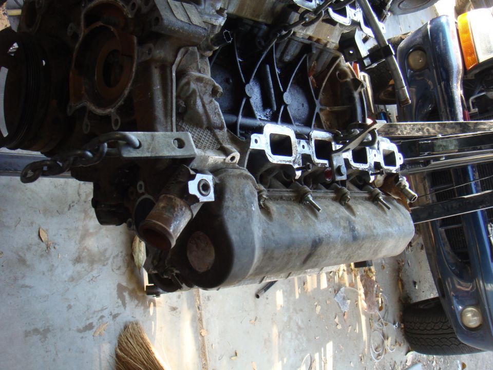Engine block with intake manifold and exhaust ports