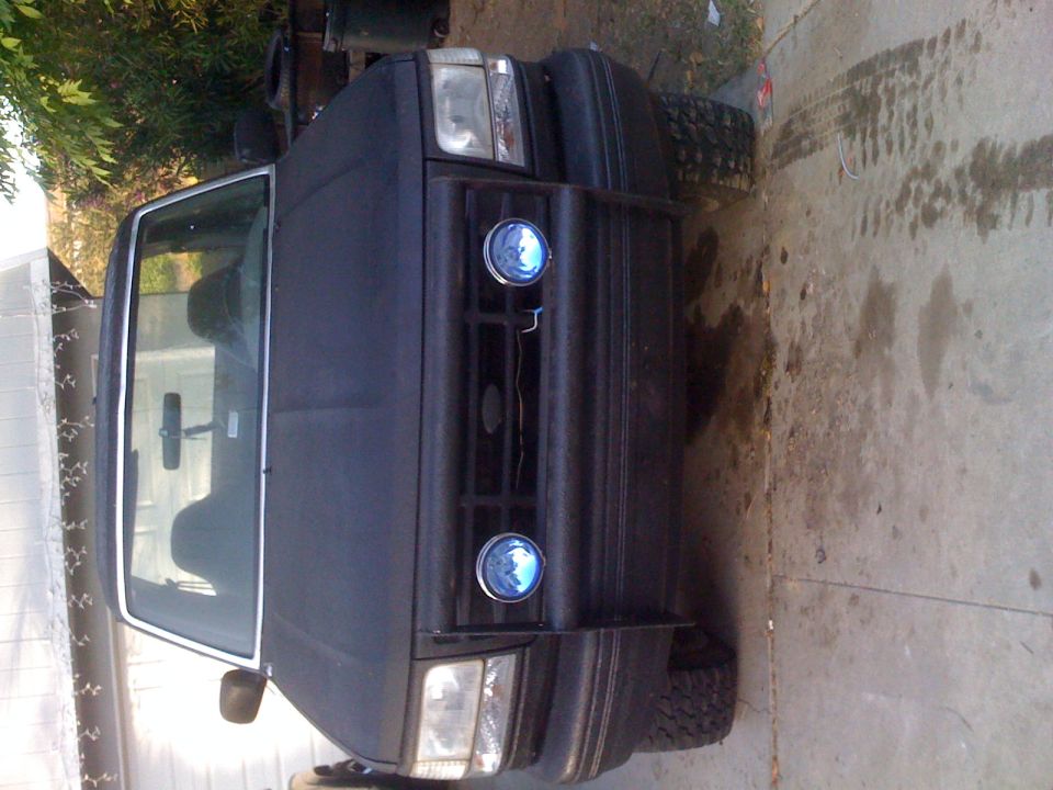 1992 Ford Bronco front view with aftermarket blue fog lights