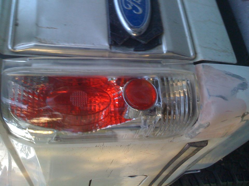 Close-up of a 1992 Ford Bronco's rear, showing the taillight and Ford emblem