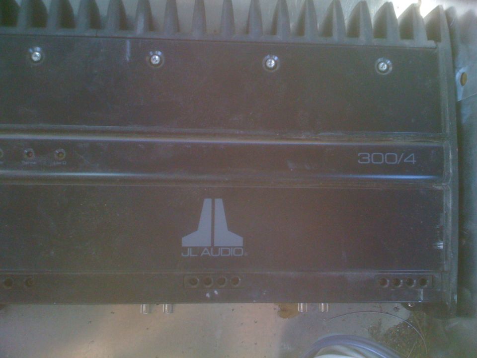 JL Audio 300/4 amplifier with heatsink fins on top