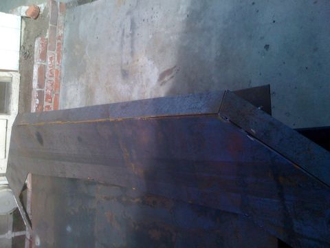 1992 Ford Bronco - Close-up of a fabricated metal object showing signs of rust and sharp, welded edges.