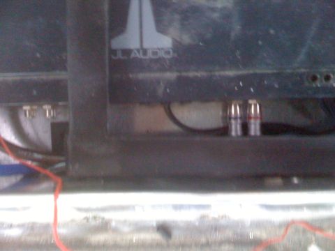 1992 Ford Bronco - Close-up of audio equipment connections, possibly in a vehicle's interior or trunk.