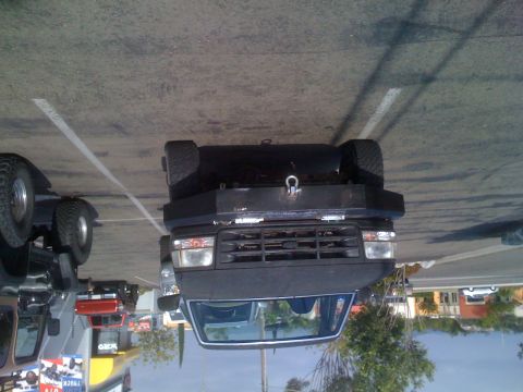 1992 Ford Bronco - Front view of a 1992 Ford Bronco with a custom bumper and tow hitch.