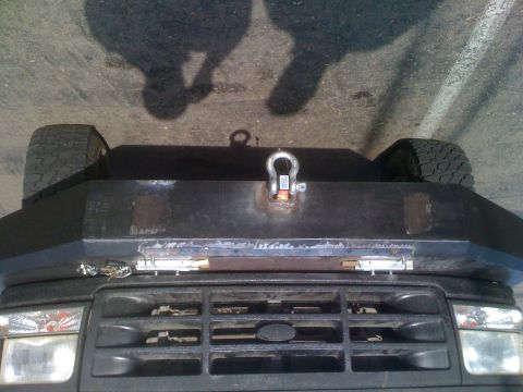 1992 Ford Bronco - Front view of a 1992 Ford Bronco, showing the grille and custom bumper.