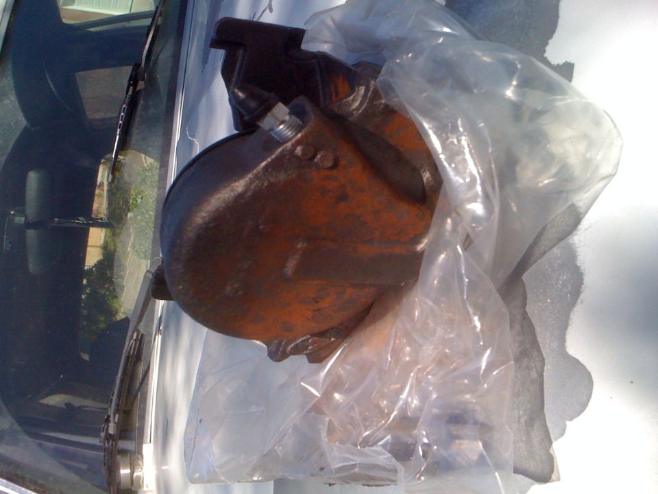 Part in plastic bag on car windshield