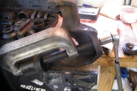 1989 Ford Bronco - The ball joint press in action. In this photo the upper ball joint is coming out. You have to do the lower first in order to getk the upper…