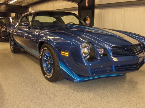 1979 Chevrolet Camaro - This 1979 Chevrolet Camaro features a distinctive blue paint job with silver racing stripes and custom body kit.