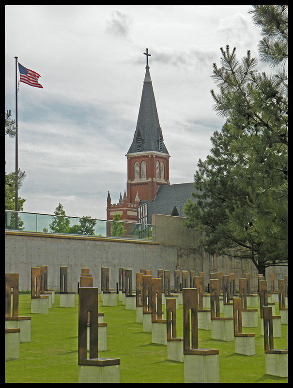 Oklahoma City National Memorial with chairs and church steeple