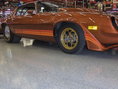 1979 Chevrolet Camaro - This 1979 Chevrolet Camaro drag car features a distinctive stripe pattern and gold racing wheels.