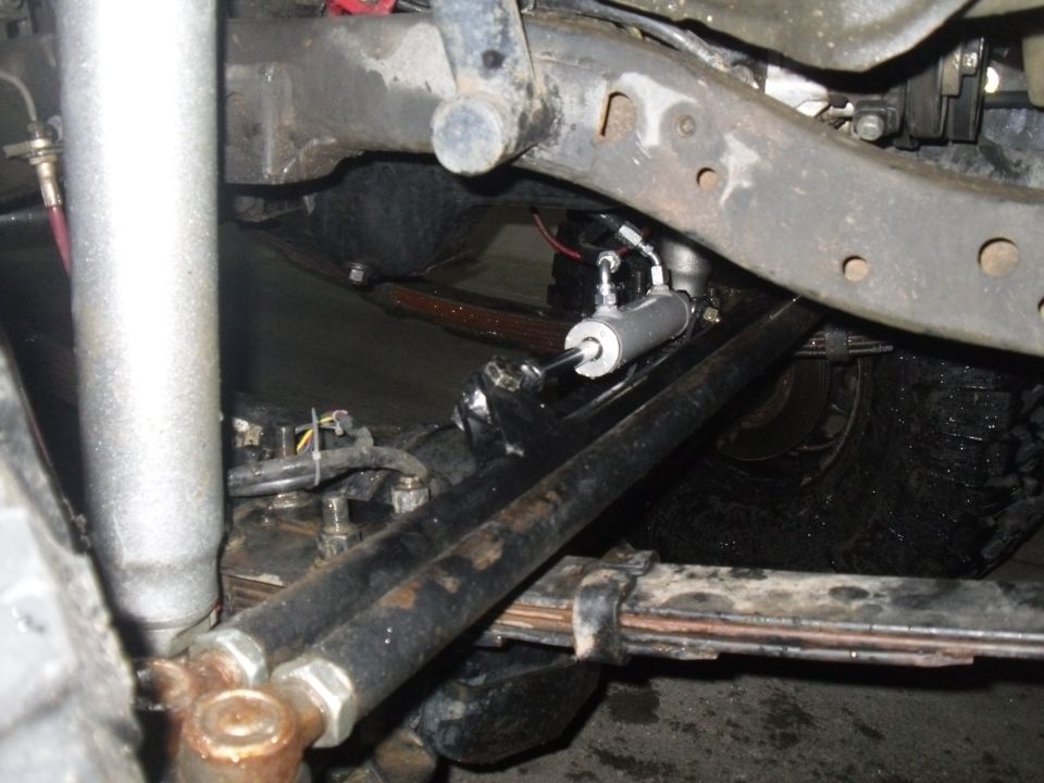 close-up of steering stabilizer on a vehicle's suspension