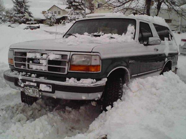 1996 Ford Bronco stuck in deep snow, front view