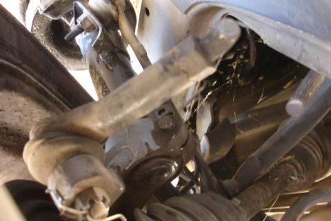 1992 Ford Taurus - Undercarriage view of various mechanical components, likely from a vehicle's suspension system.