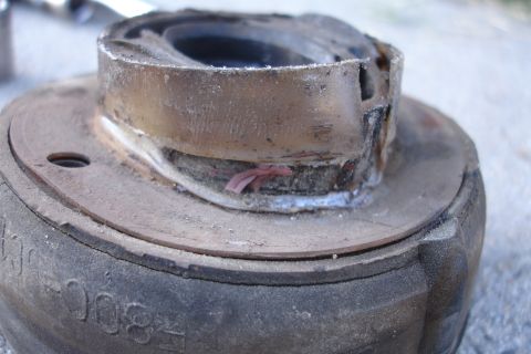 1992 Ford Taurus - A worn suspension component, possibly from a Ford F800 truck, is shown in detail.