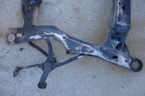 1992 Ford Taurus - Front subframe assembly with suspension components, likely removed for repair or replacement.