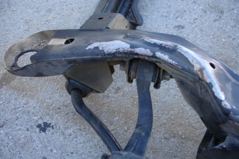 1992 Ford Taurus - This image shows a detached vehicle subframe with suspension components, indicating a part replacement or repair.