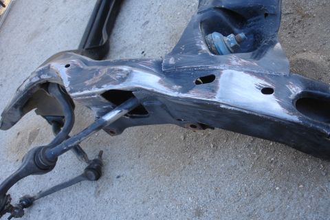 1992 Ford Taurus - A disassembled vehicle subframe assembly is shown, indicating repair or replacement work.