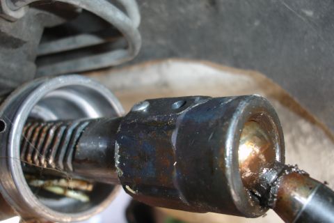 1992 Ford Taurus - This image shows a close-up of a vehicle's suspension component, likely related to steering or wheel articulation.