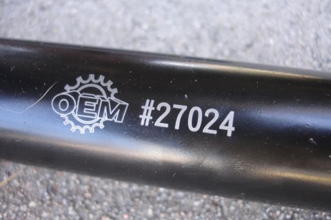1992 Ford Taurus - A black metal part with an OEM logo and the number 27024 is visible.