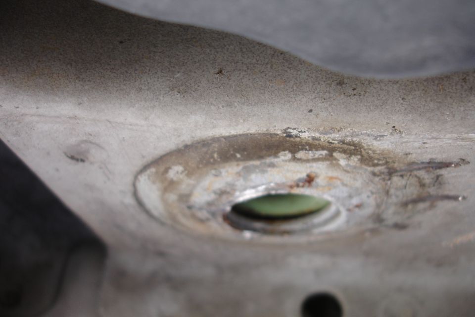close-up of a metal part with a circular recess