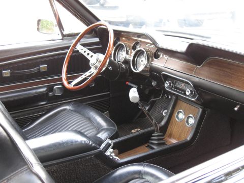 1968 Shelby GT500 - Interior view of a 1968 Shelby GT500, showing the dashboard, steering wheel, and seats.
