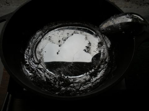 1996 Ford Bronco - Molten metal is being processed in a crucible, likely for casting or reloading purposes.