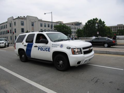 1991 Ford Crown Victoria - Federal Protective Service police SUV with Homeland Security insignia is seen on patrol.