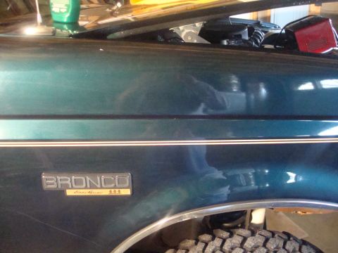 1995 Ford Bronco - Close-up of the Bronco Eddie Bauer fender emblem on a 1995 model.