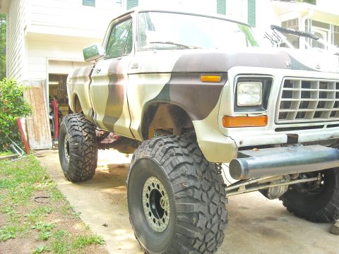 1979 Ford F-150 - Customized 1979 Ford F-150 pickup truck camouflage paint and lifted suspension.