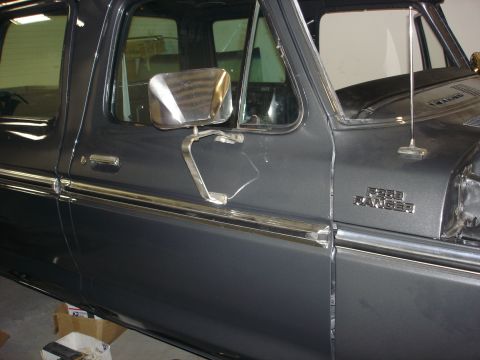 1979 Ford F-250 - Close-up of the side of a 1979 Ford F-250 Crewcab, showing the door and fender with 'Ford Ranger' badging.