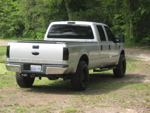 2008 Ford F-250 - This 2008 Ford F-250 Super Duty pickup truck is shown from the rear, parked outdoors.