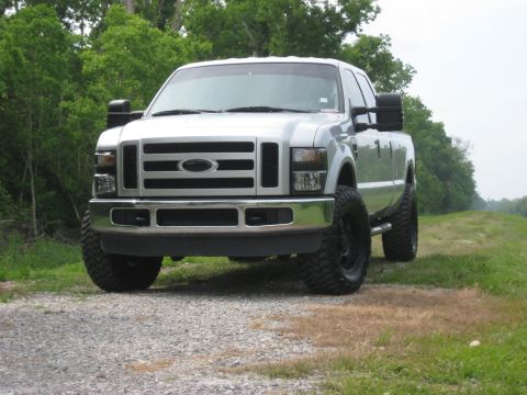 2008 Ford F-250 - Front view of a silver 2008 Ford F-250 pickup truck on a gravel road.