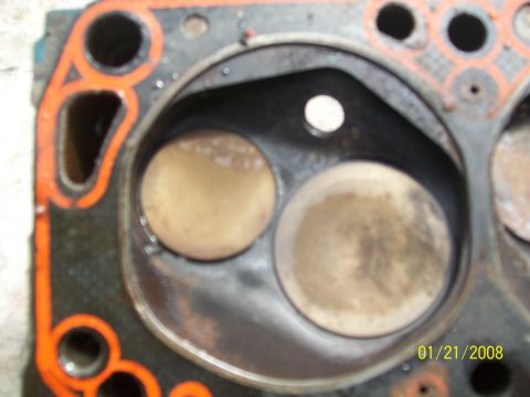 1972 Ford Ranchero - Close-up of an engine cylinder head, likely showing signs of wear or damage.