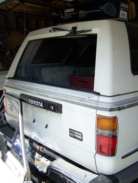 1988 Suzuki Samurai - This 1989 Toyota 4Runner is seen from the rear, parked indoors.
