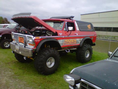 1995 Ford Bronco - This lifted Ford Bronco, possibly from the late 1970s, is displayed with its hood open and a "FOR SALE" sign on the grille.