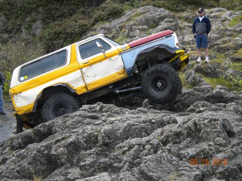 1994 Ford Explorer - An off-road SUV navigates a rocky path, with a date stamp of 05 15 2010 visible in the lower right corner.