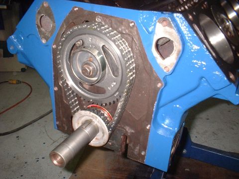 1969 Ford Torino - Engine timing chain and gears assembly on a blue painted block.