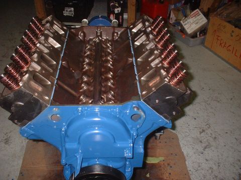 1969 Ford Torino - Close-up of a blue engine block copper-colored valve springs and intake ports.