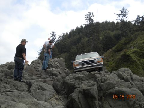 1994 Ford Explorer - 1994 Ford Explorer driving over rocks near the coast on May 15, 2010.