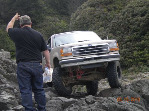 1994 Ford Explorer - 1994 Ford Explorer tackles a challenging rocky path off-road.