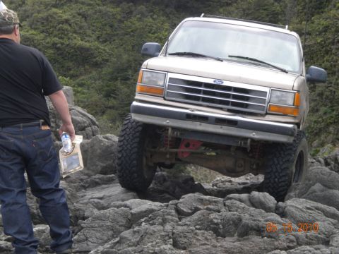 1994 Ford Explorer - A 1994 Ford Explorer navigates a rocky terrain, demonstrating its off-road capabilities.