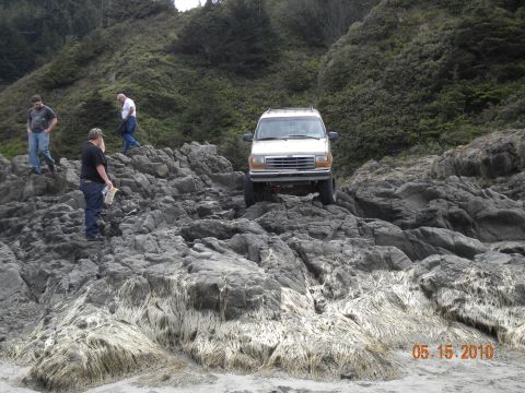 1994 Ford Explorer - A 1994 Ford Bronco navigates a rocky coastal terrain on May 15, 2010.