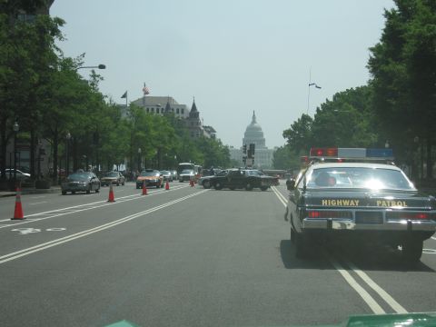 1991 Ford Crown Victoria - A highway patrol car is seen on a street in Washington D.C., with the Capitol building in the background.