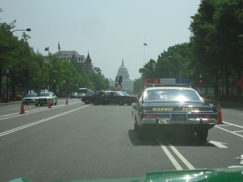 1991 Ford Crown Victoria - A Highway Patrol car is seen on a street leading towards the US Capitol building.