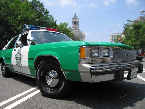 1991 Ford Crown Victoria - This 1991 Ford Crown Victoria is marked as a Sheriff's vehicle and is seen on a city street.