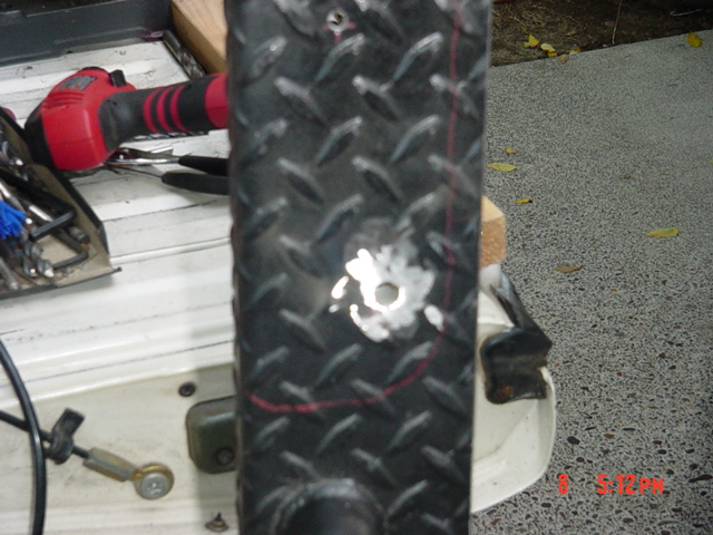 To get a flush mount with the bolts and washers, we needed to knock off some of the diamond plate.  It's OK, we will paint later.