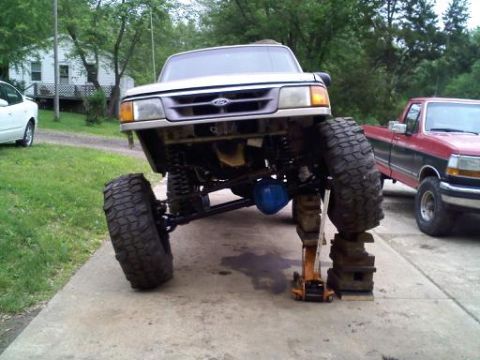 1997 Ford Ranger - This modified 1997 Ford Ranger is elevated on blocks, its lifted suspension and oversized tires.