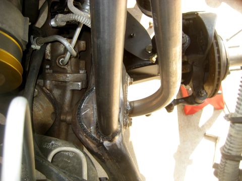 1996 Ford Bronco - Custom exhaust and suspension parts shown in detail, with visible brake and steering components.